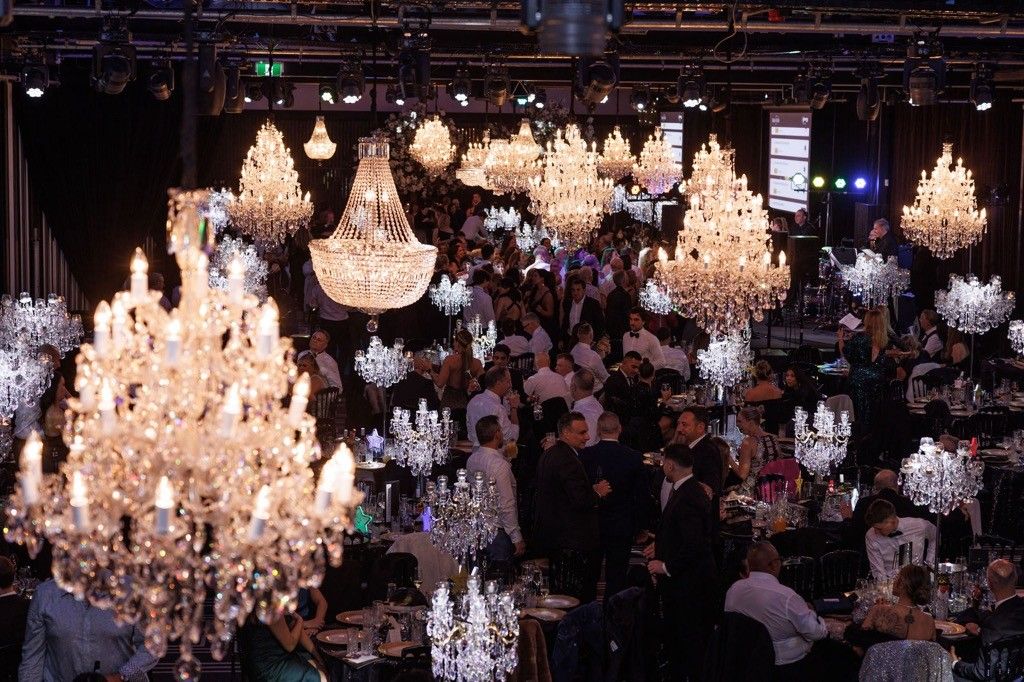 Trending luxury event decor with chandeliers at a Sydney gala — Chandeliers to Die For
